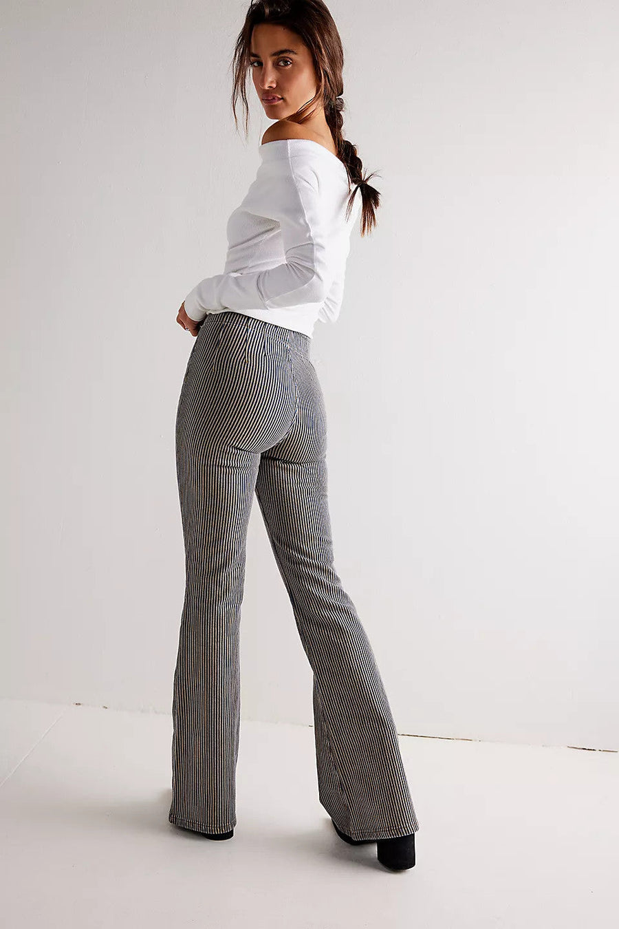 Free People Jayde Railroad Flare Jeans in Train Car Stripe – back view
