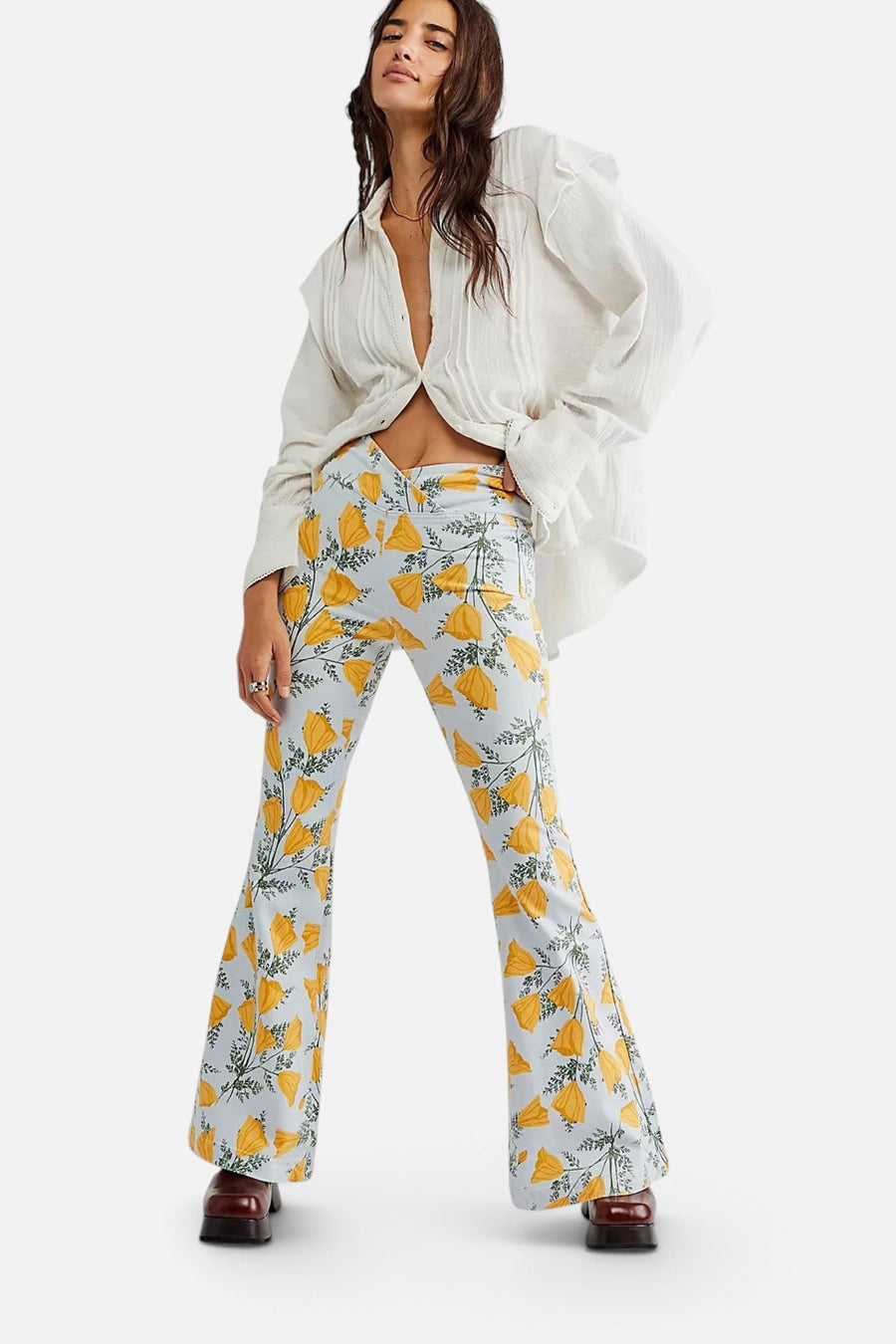 Free People Venice Beach Printed Flare Jeans in Sky Combo Cali Poppies – on model
