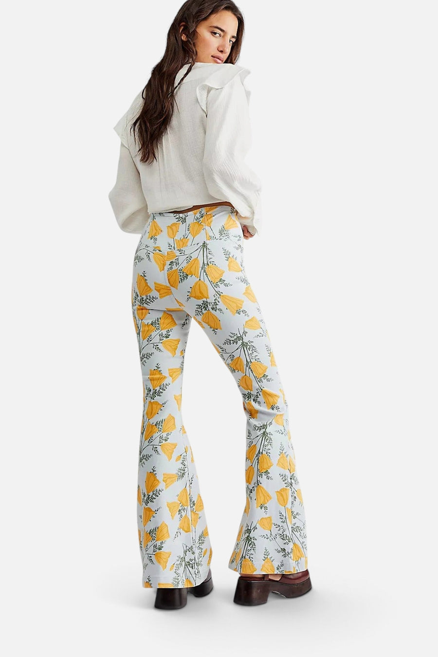 Free People Venice Beach Printed Flare Jeans in Sky Combo Cali Poppies – on model