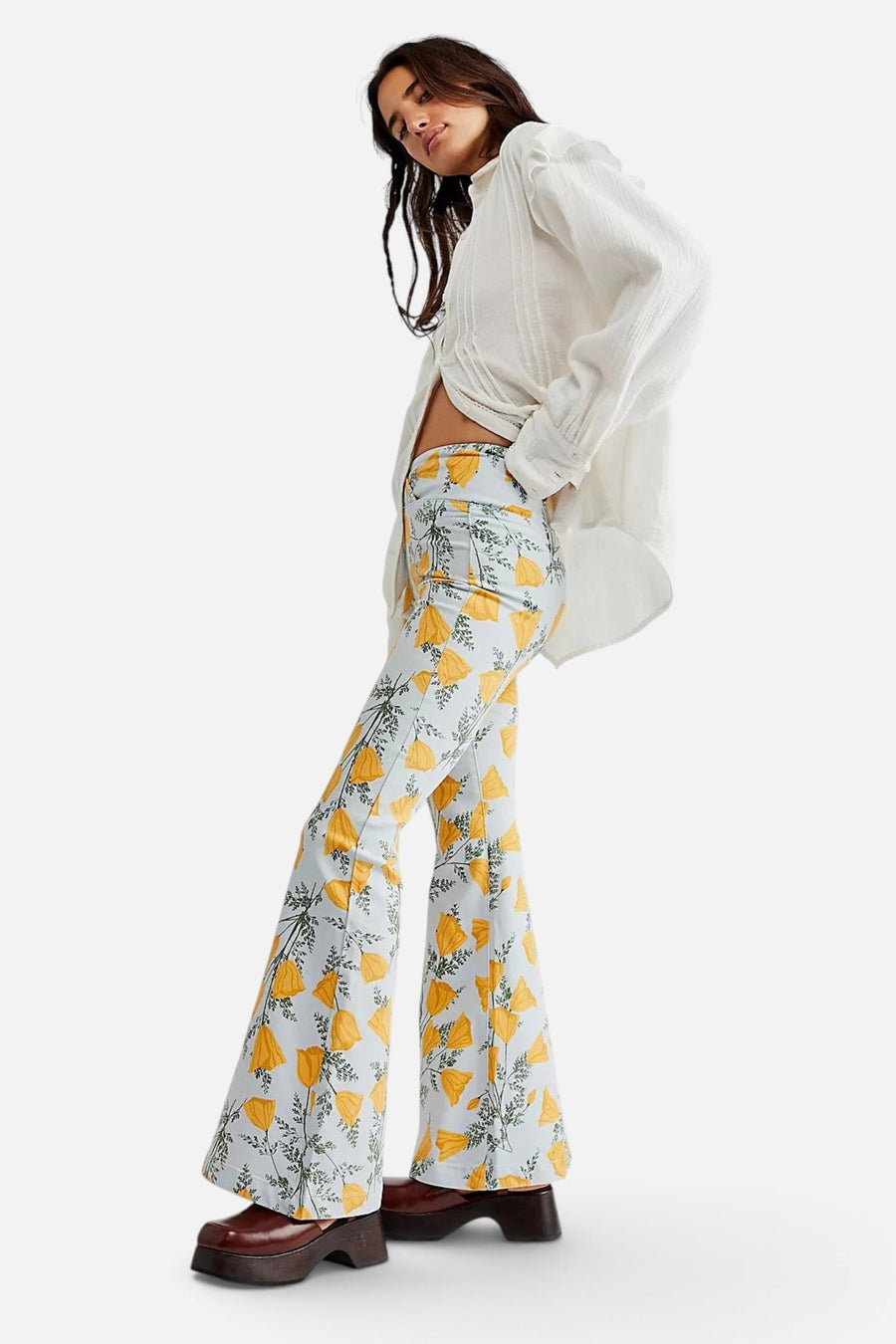 Free People Venice Beach Printed Flare Jeans in Sky Combo Cali Poppies – on model