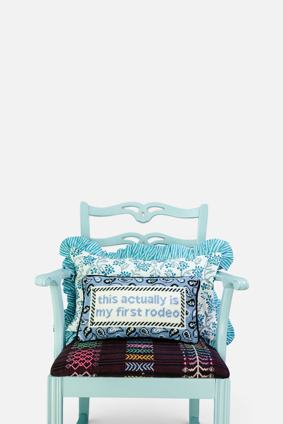 Furbish First Rodeo Needlepoint Pillow – flat lay