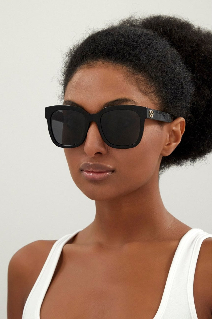Gucci Rectangular Sunglasses in Black (GG0034SN 001 54) – on model