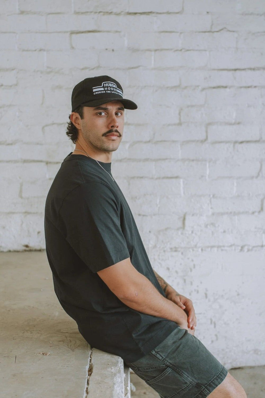 Huega House Umage | Black Hat – flat lay
