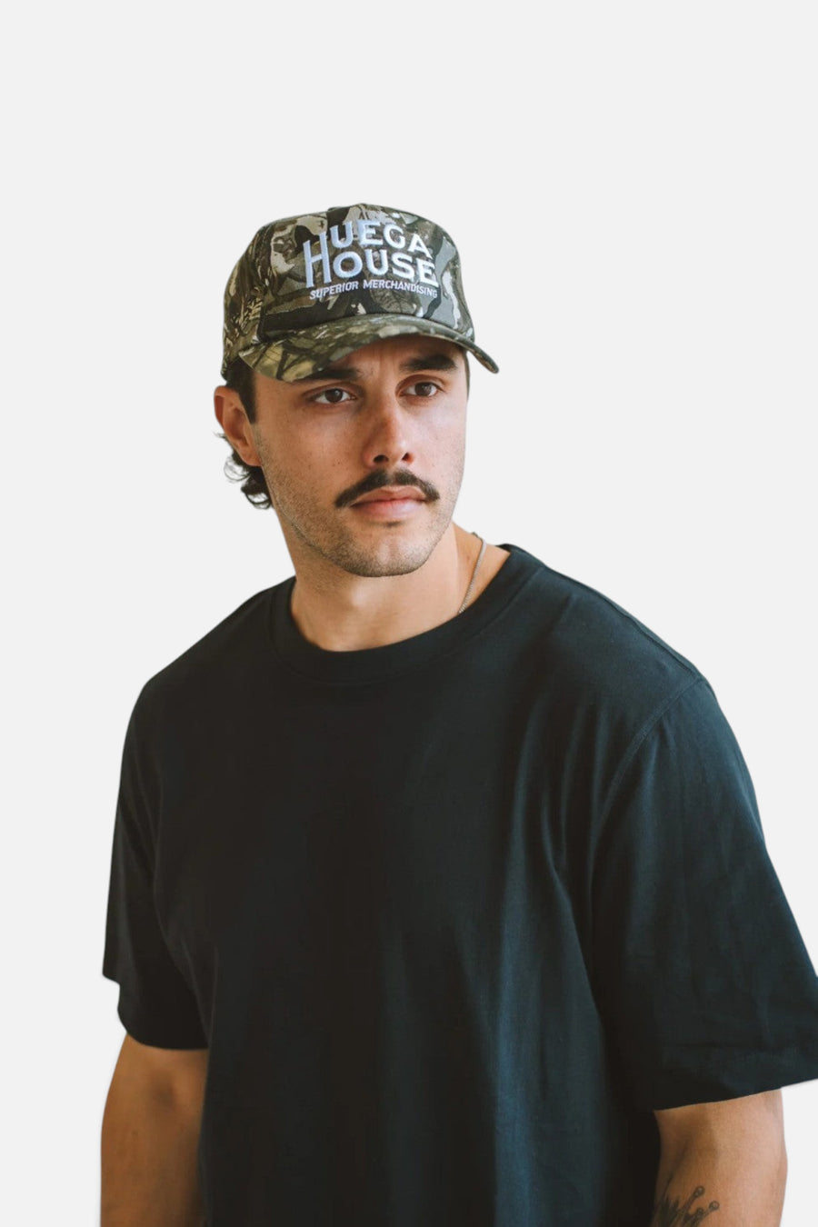 Huega House Woodland | Dark Camo Mid Profile Hat – flat lay
