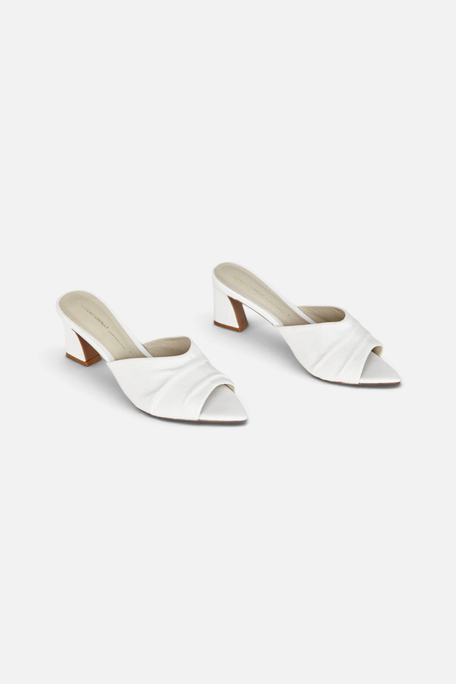 Intentionally Blank Fair Heels in White – flat lay
