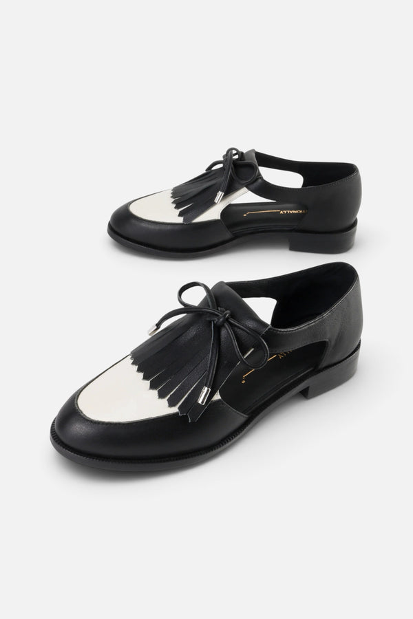 Intentionally Blank Tock Cutout Tassel Oxford in Black White