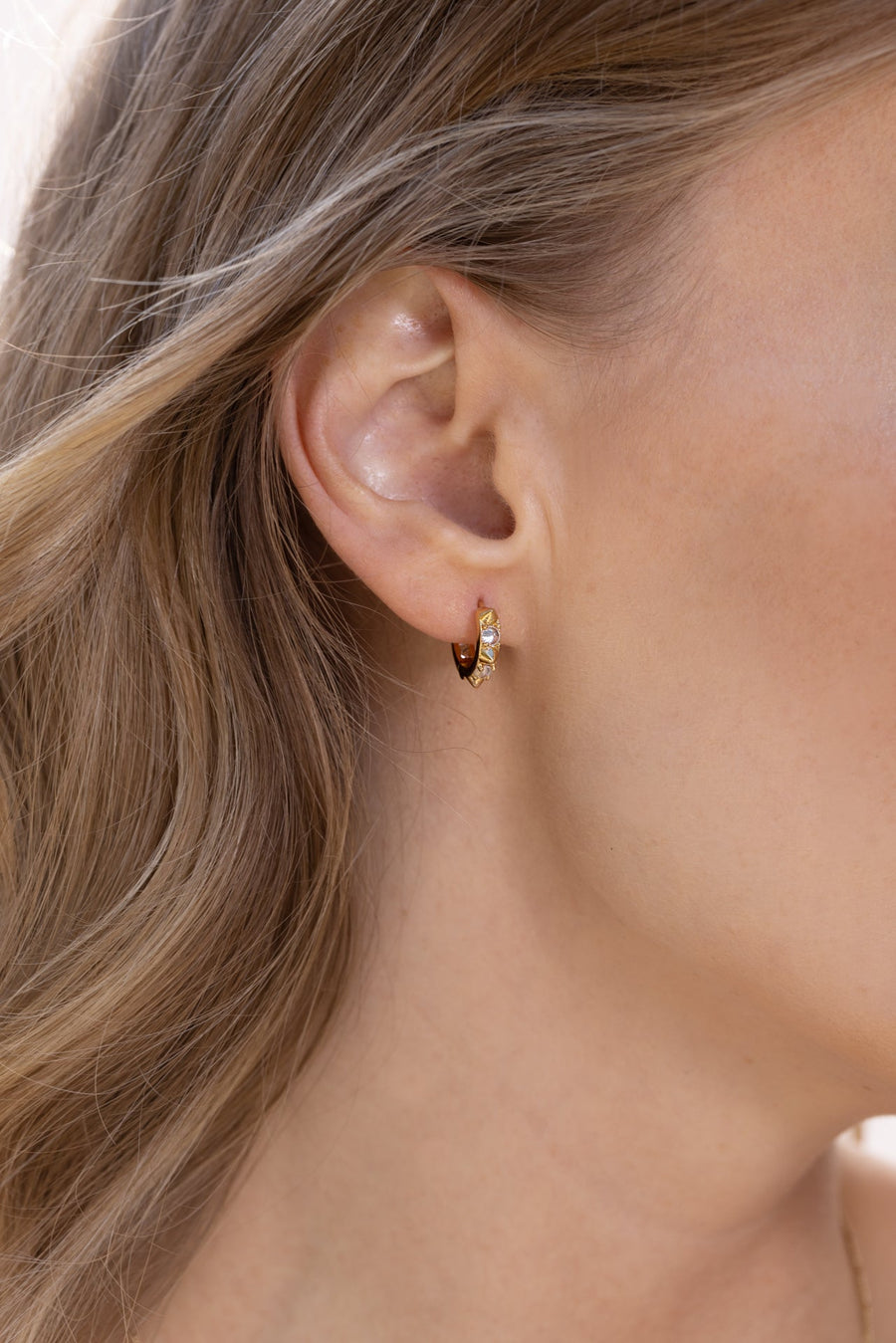 Kaia Huggies Earrings in Gold – back view
