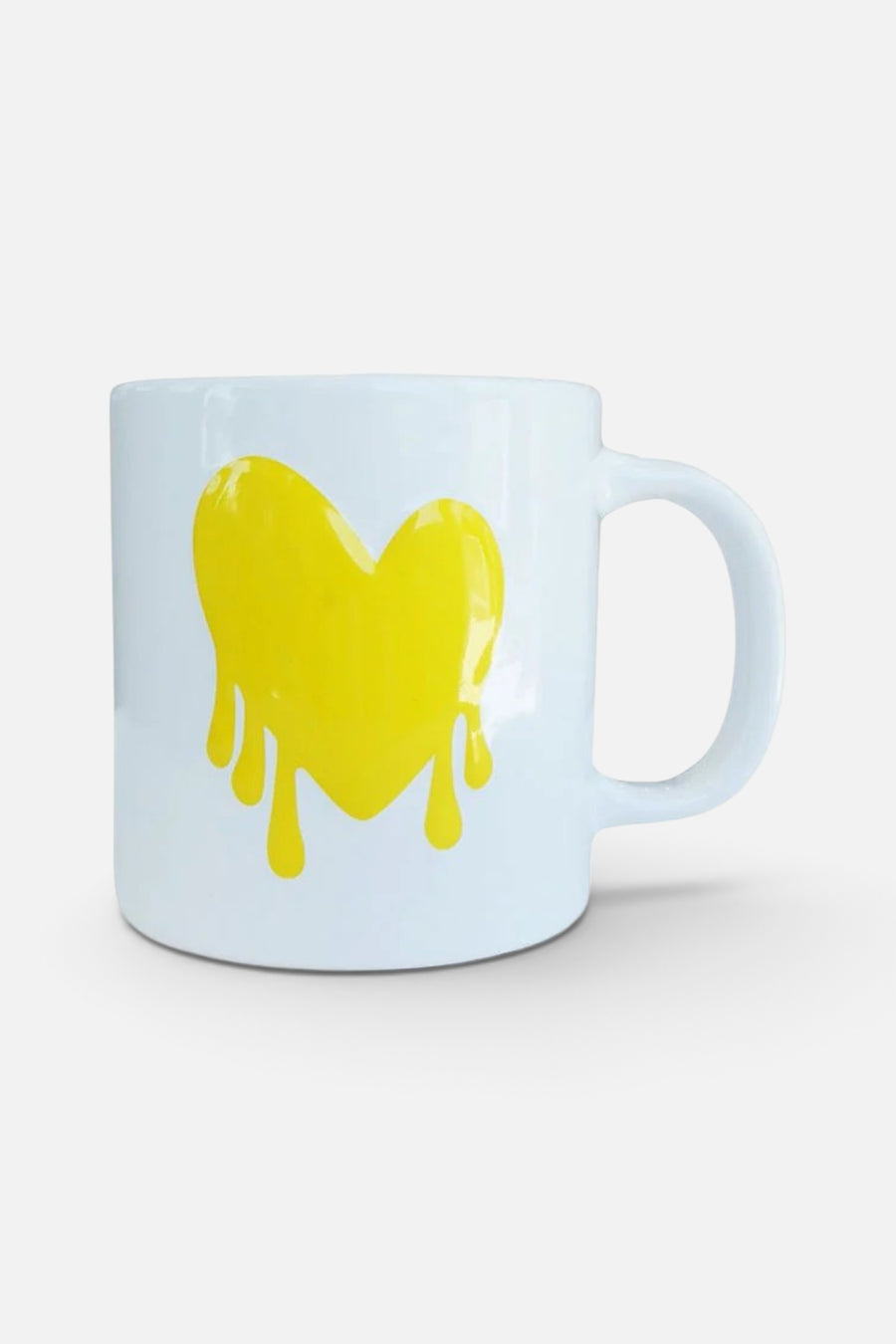Kerri Rosenthal Drippy Heart Mug In White and Yellow – front view