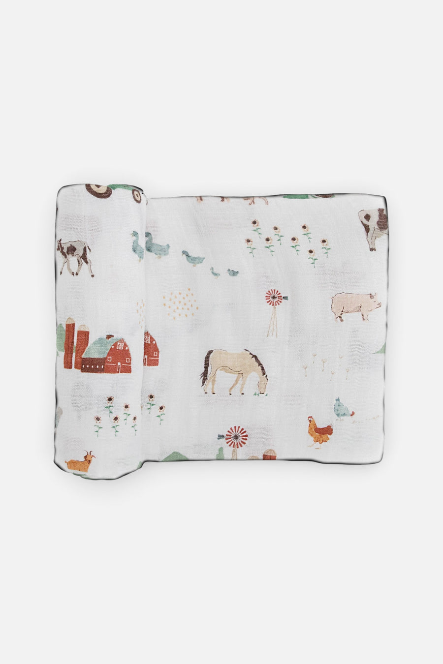 Little Unicorn Cotton Muslin Swaddle Blanket in Farmyard – front view