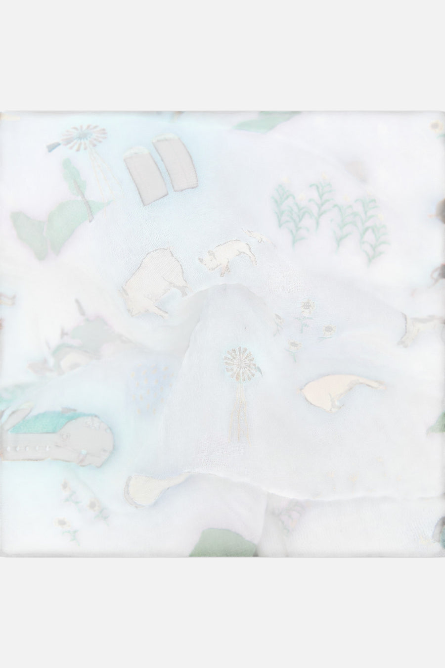 Little Unicorn Cotton Muslin Swaddle Blanket in Farmyard – side view