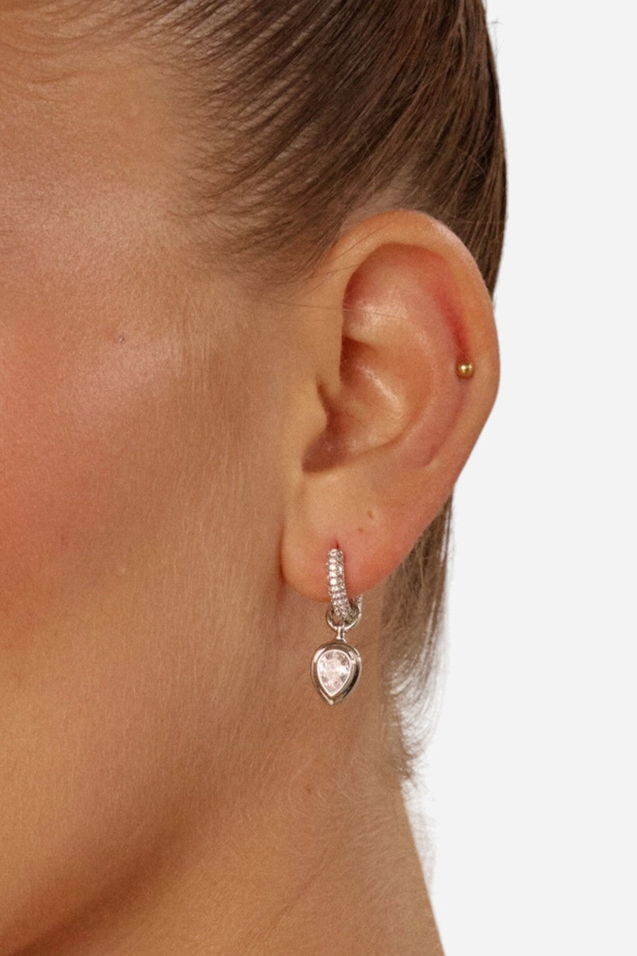 LUV AJ Pear Double Bezel Charm Huggies Earrings in Silver – back view