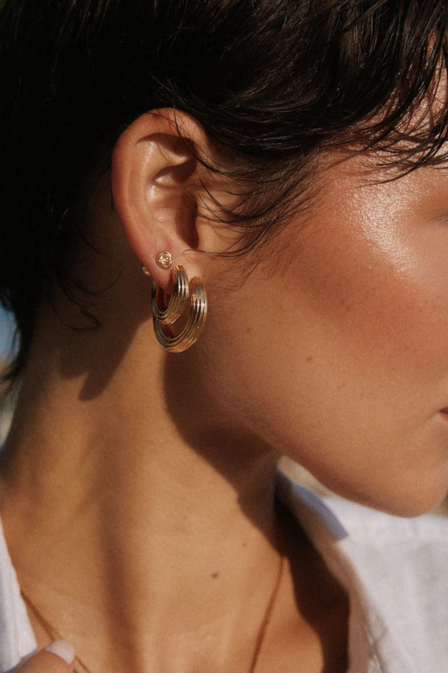 LUV AJ The Ridged Amalfi Hinge Hoops in Gold – back view