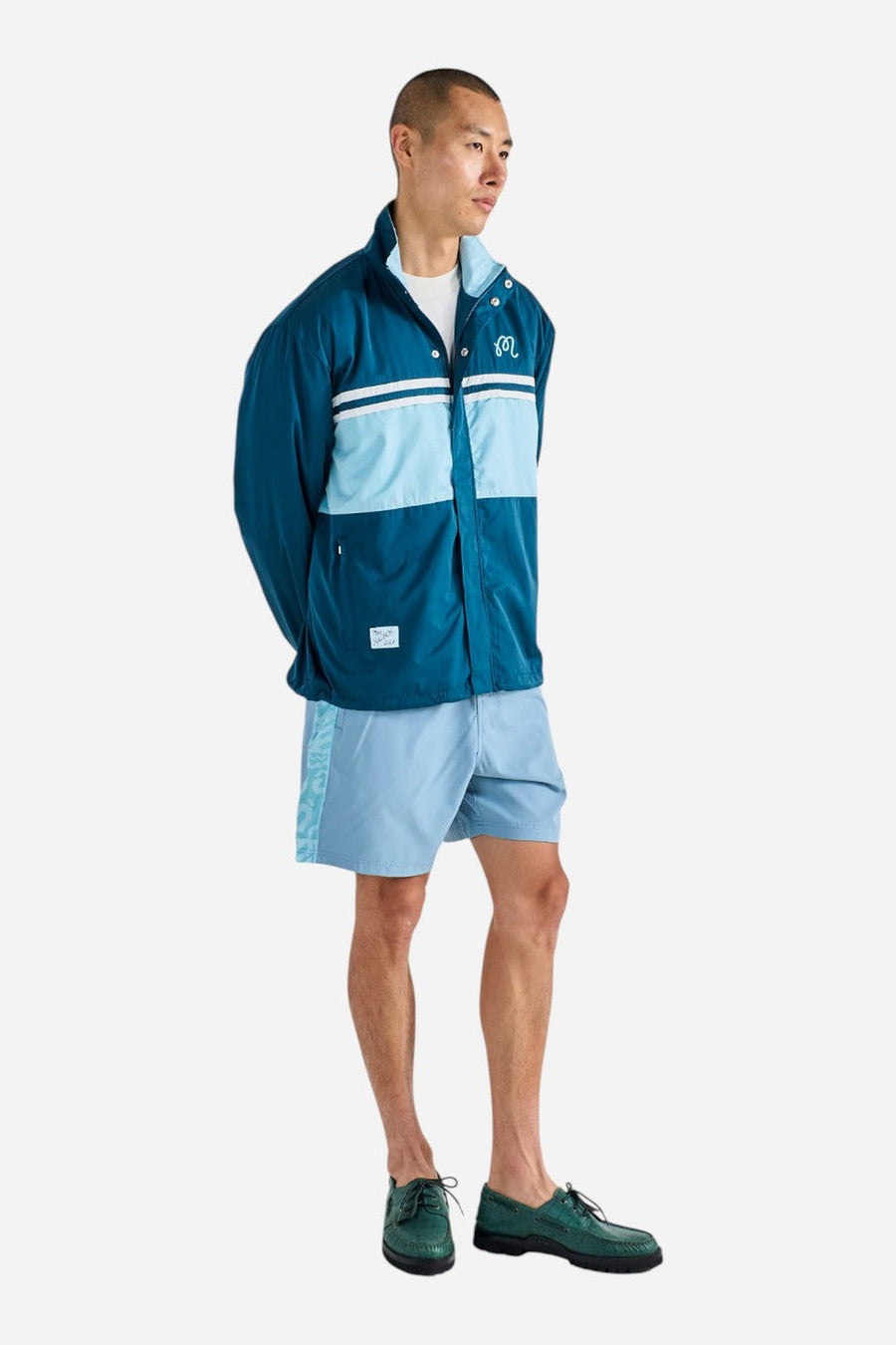 Malbon Golf Costanzo Windbreaker in Ocean – on model