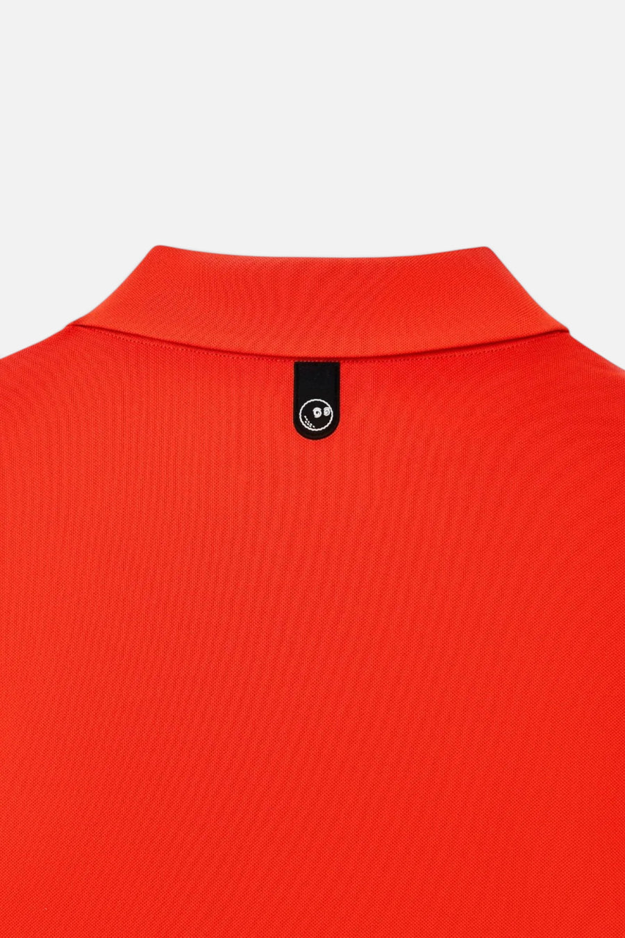Malbon Golf Fairway Polo in Grenadine Red – flat lay