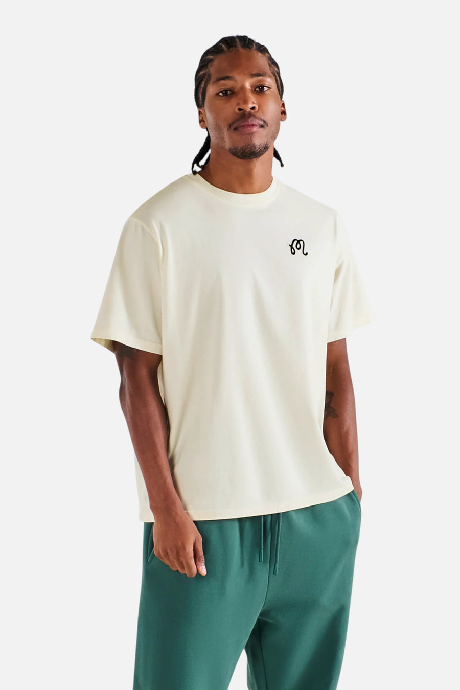 Malbon Golf Men's Bermuda Brumal Buckets Tee in Ivory – side view