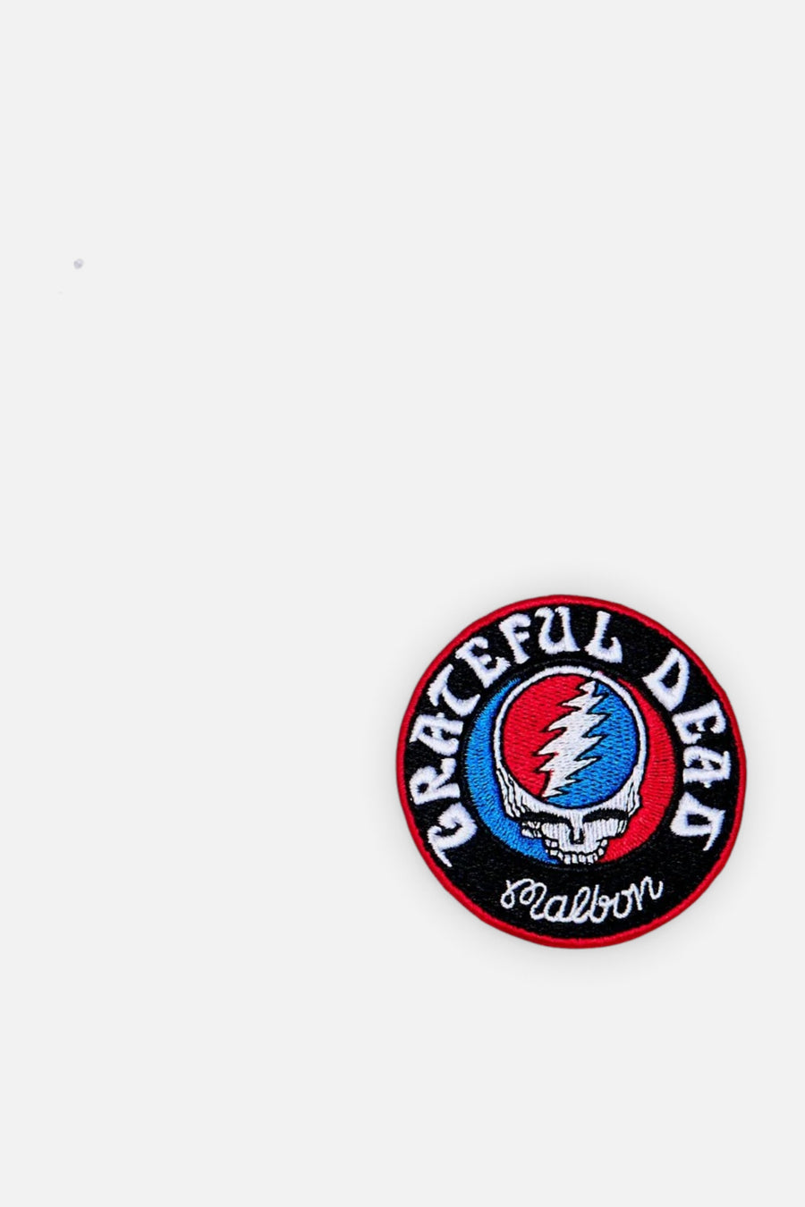 Malbon Golf Men's Grateful Dead Stealie Polo in White – detail