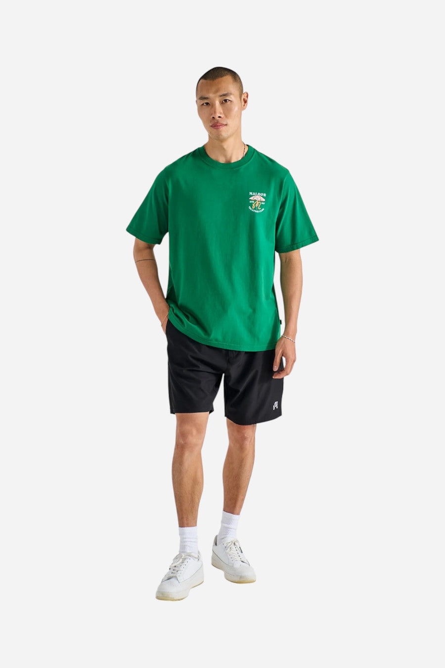 Malbon Golf Vacation Club Tee in Kelly Green – back view