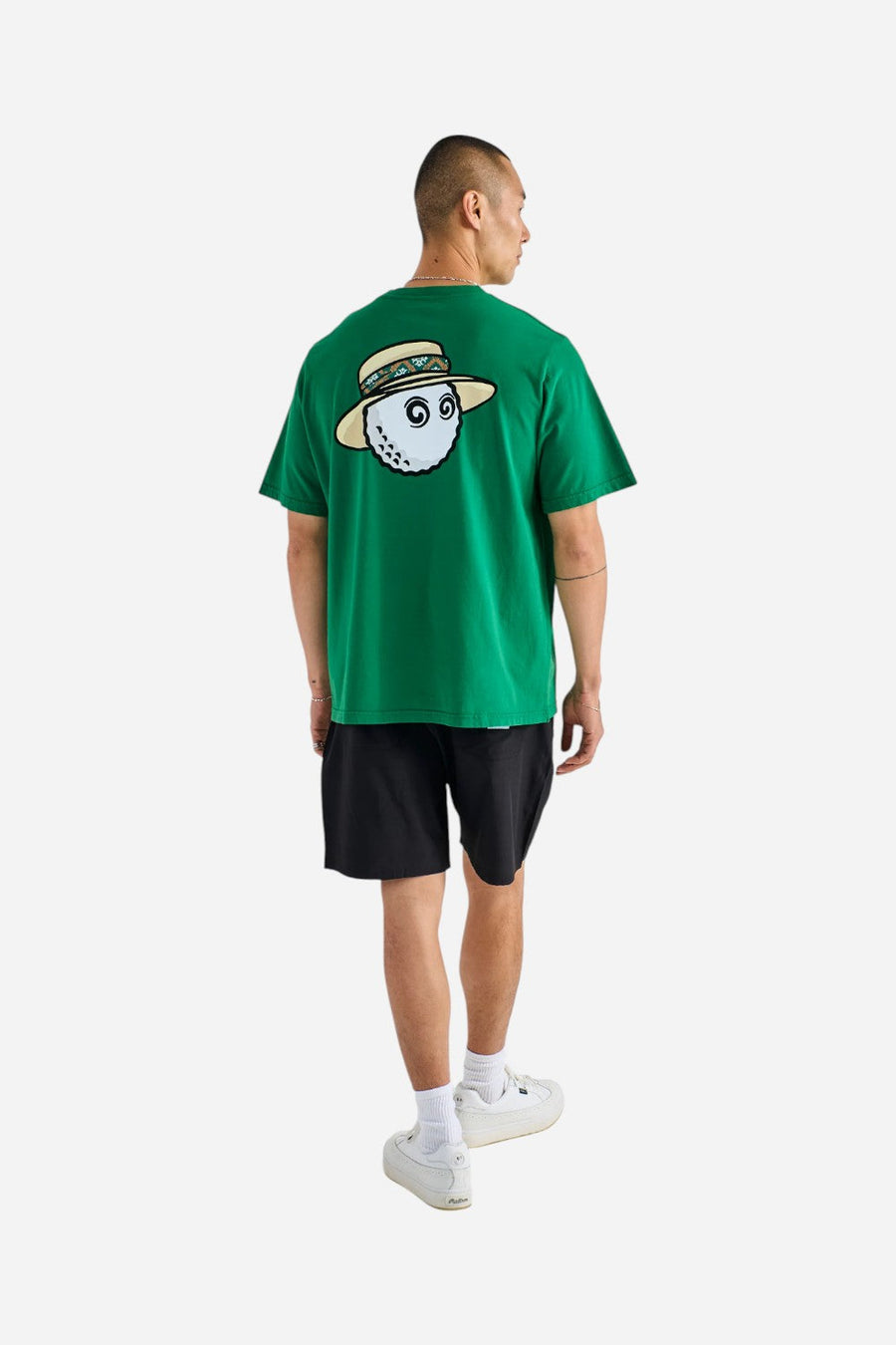 Malbon Golf Vacation Club Tee in Kelly Green – flat lay