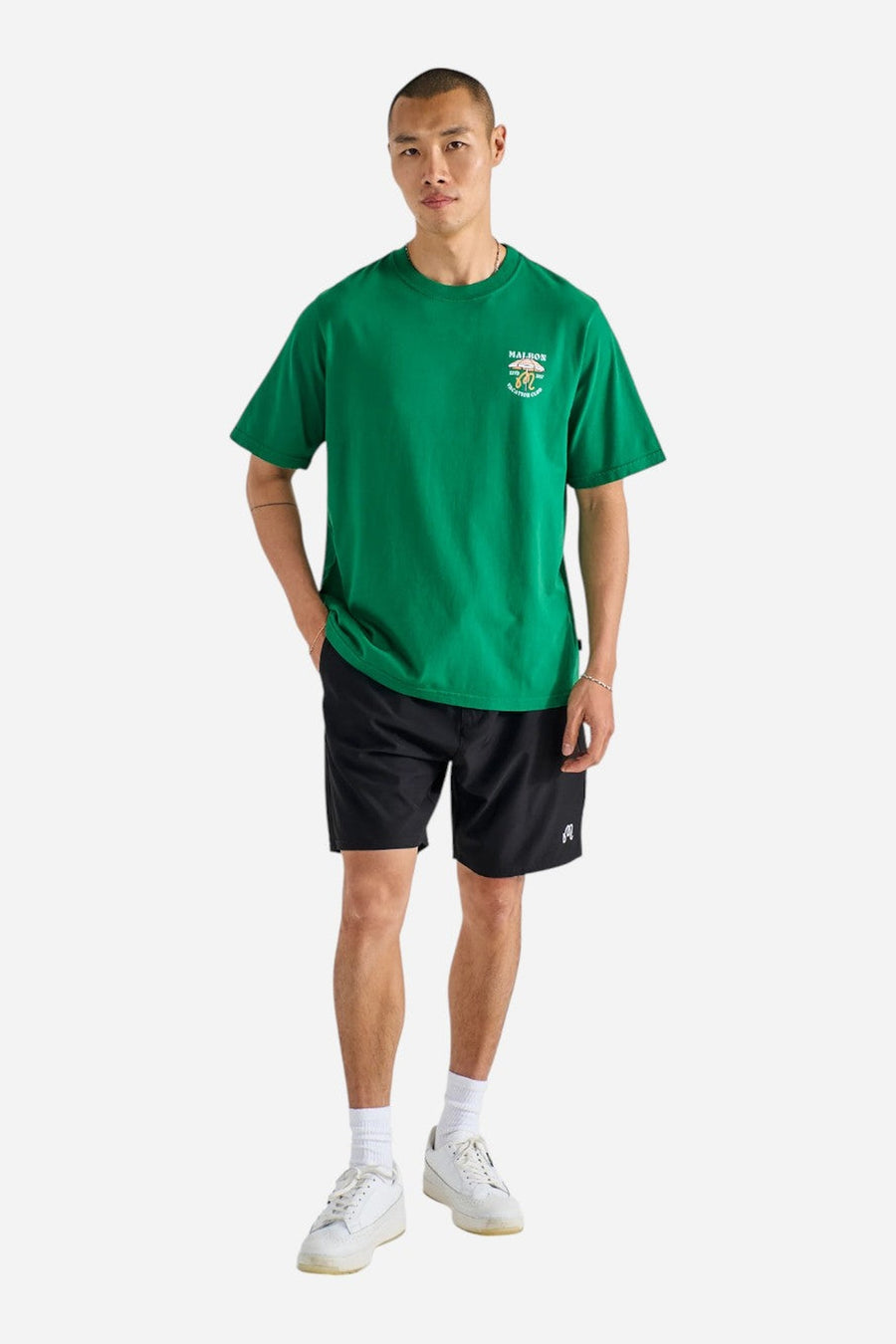 Malbon Golf Vacation Club Tee in Kelly Green – side view