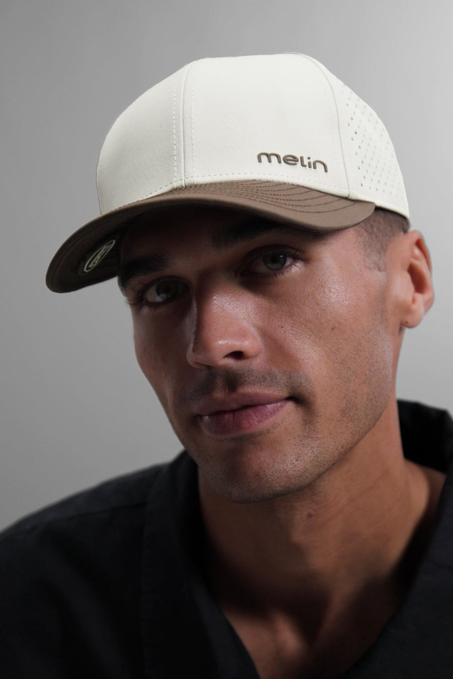 Melin Compass Hydro Hat in Frosted Birch – flat lay