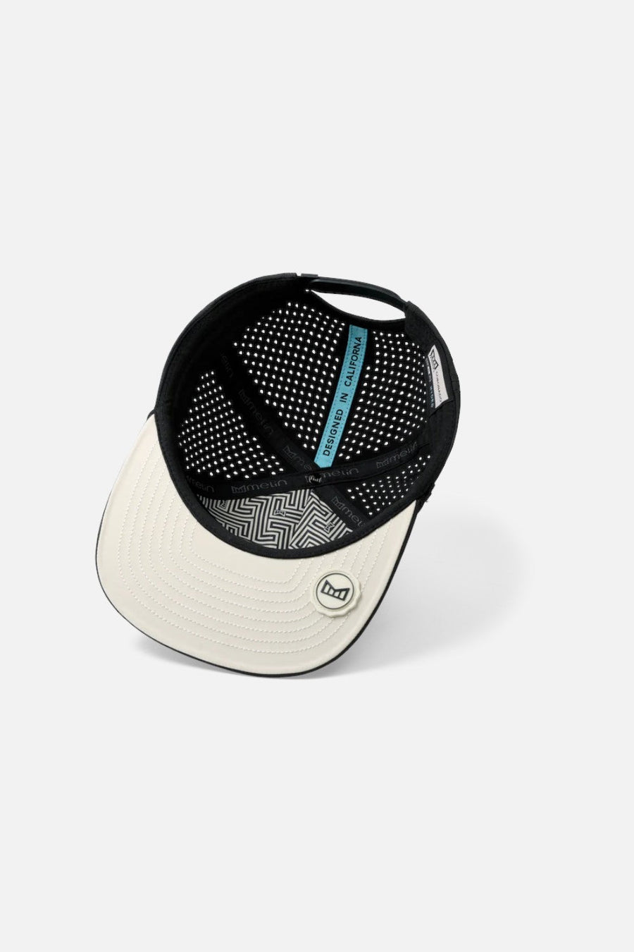 Melin Coronado Brick Hydro Cap in Faded Black – flat lay
