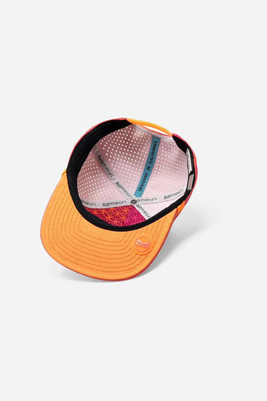 Melin Coronado Brick Hydro Hat in Sunset Aura – flat lay