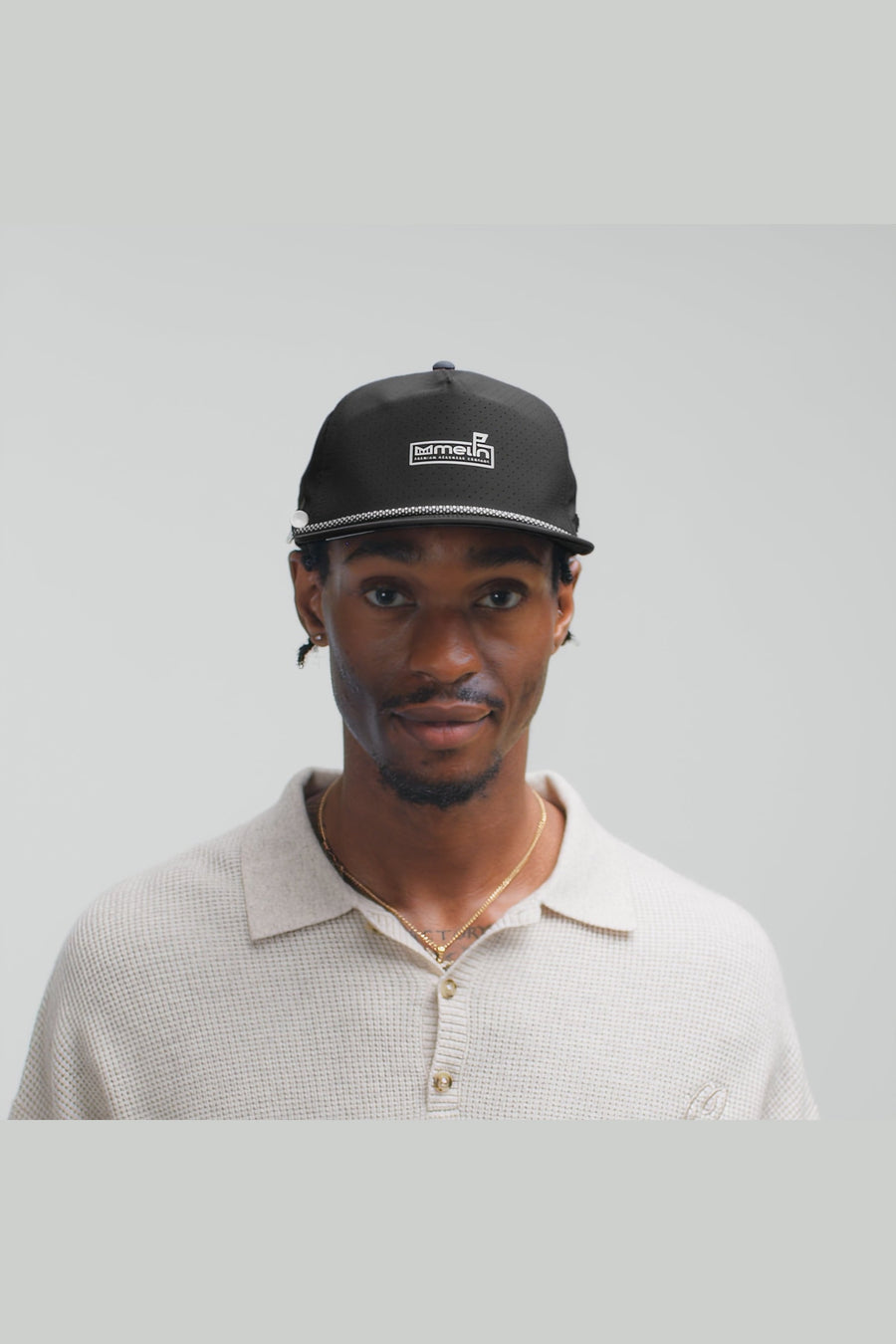 Melin Coronado Links Hydro Hat in Black – on model