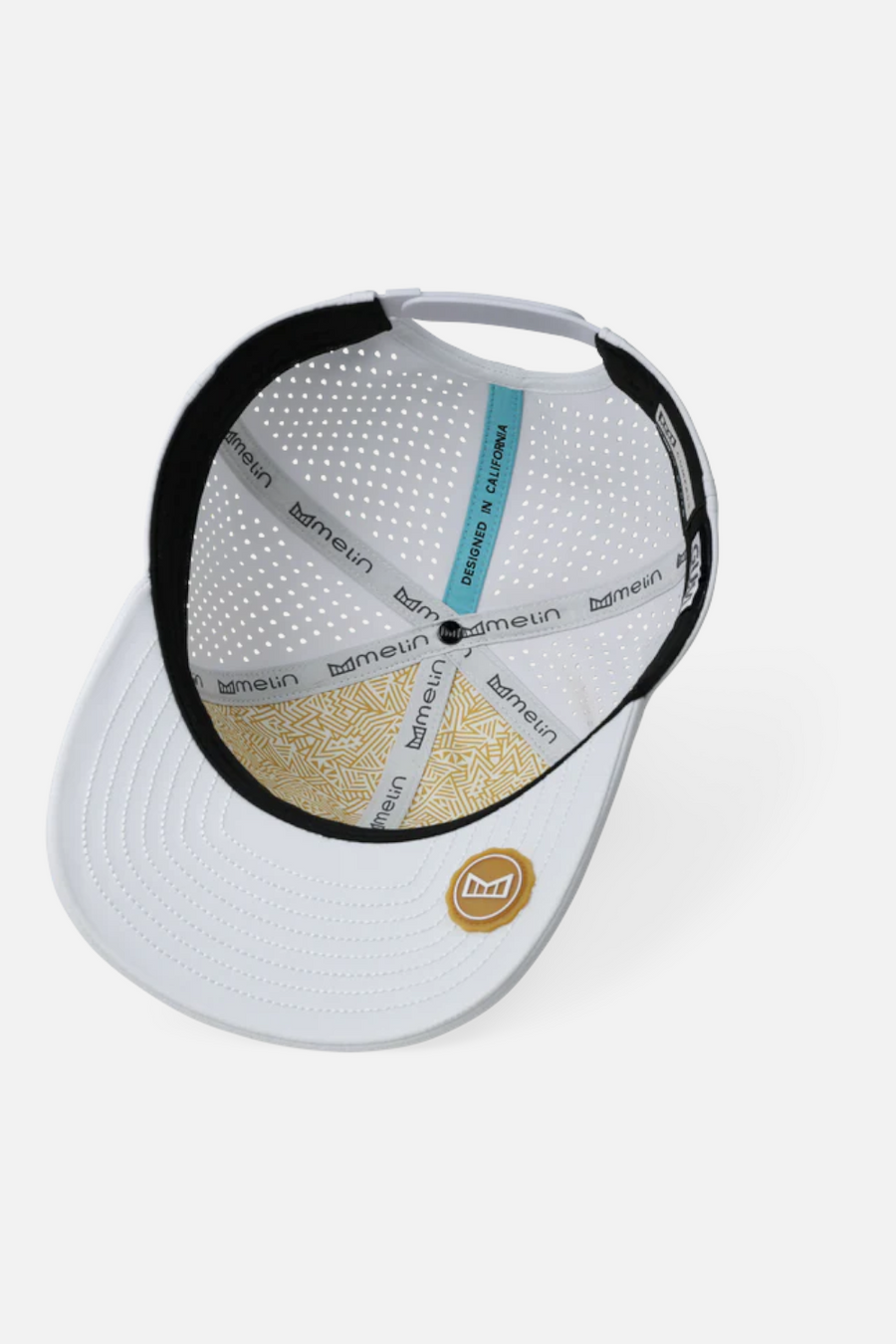 Melin Hydro Compass Cap in Gum and White – flat lay