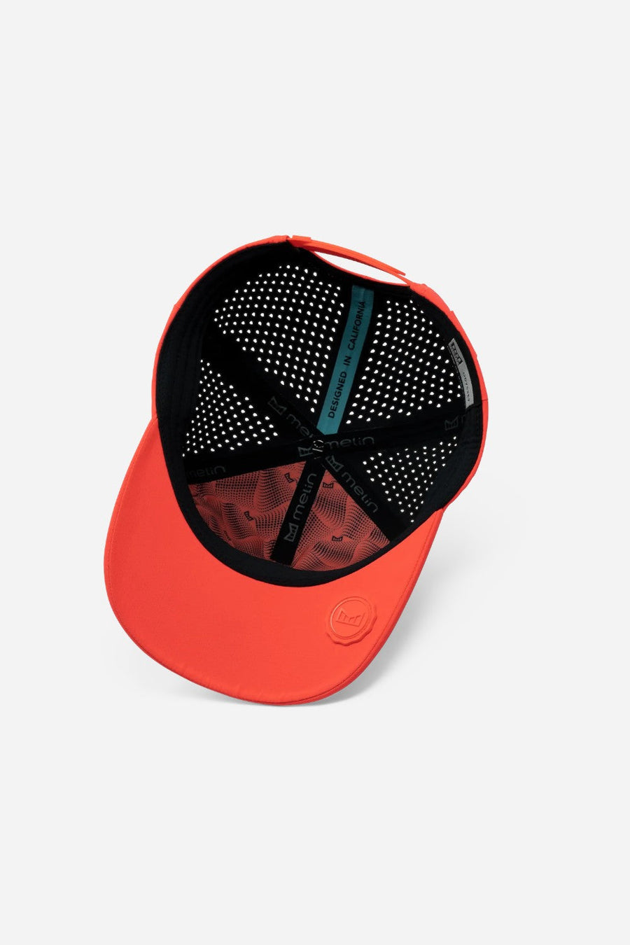 Melin Odysea Hydrolite Hat in Infared – flat lay