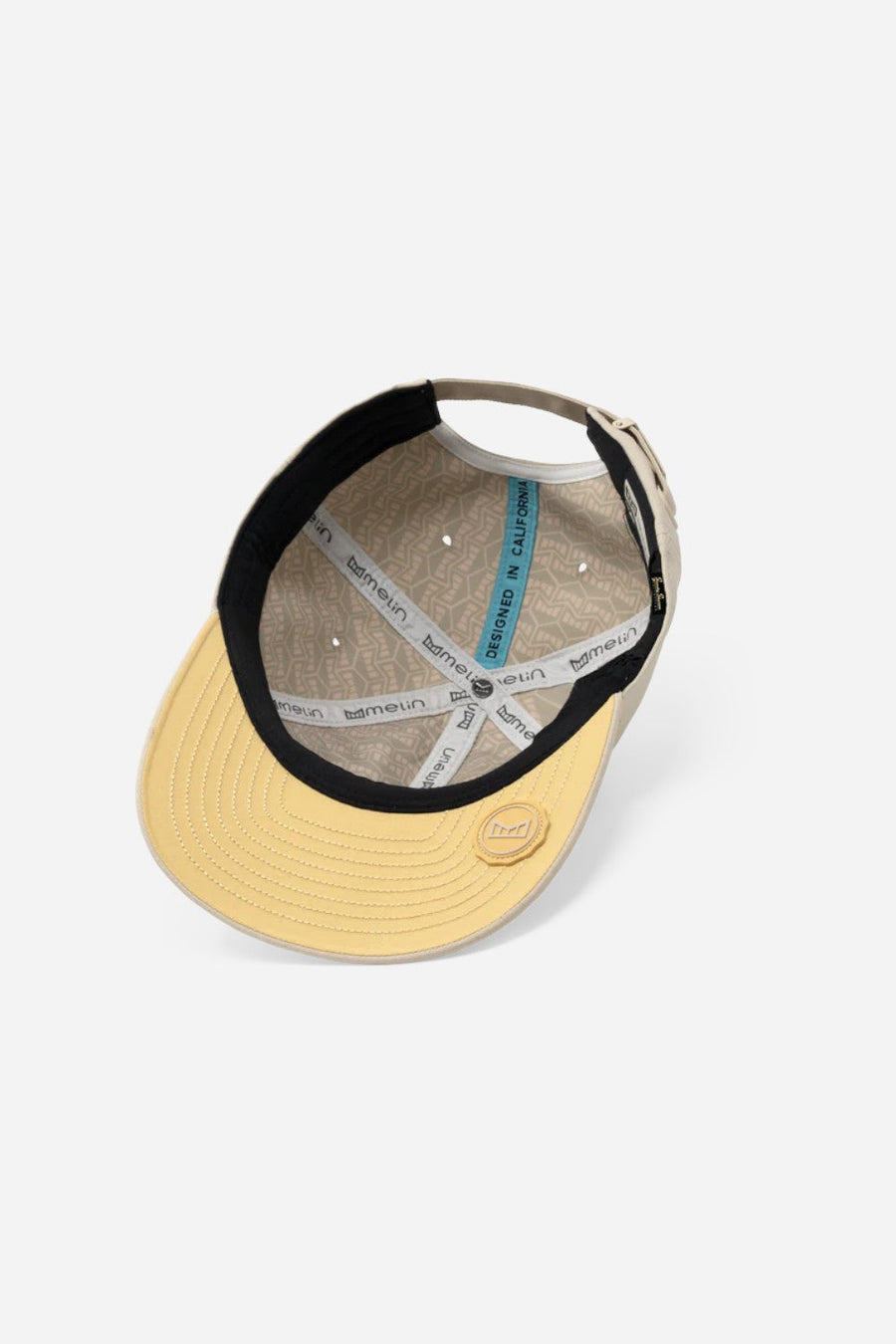Melin The Legend Hydro Hat in Sandshell – flat lay