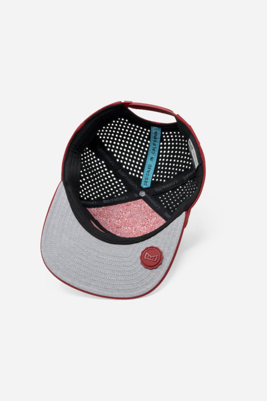 Melin Trenches Icon Hydro Snapback Hat in Red – flat lay