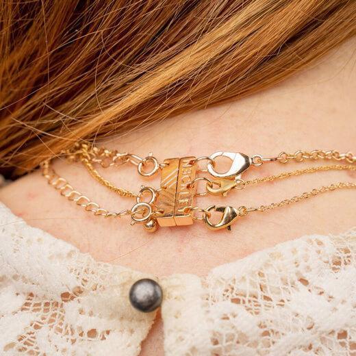 Necklet Stainless Steel Rose Gold Triple Layering Clasp – flat lay