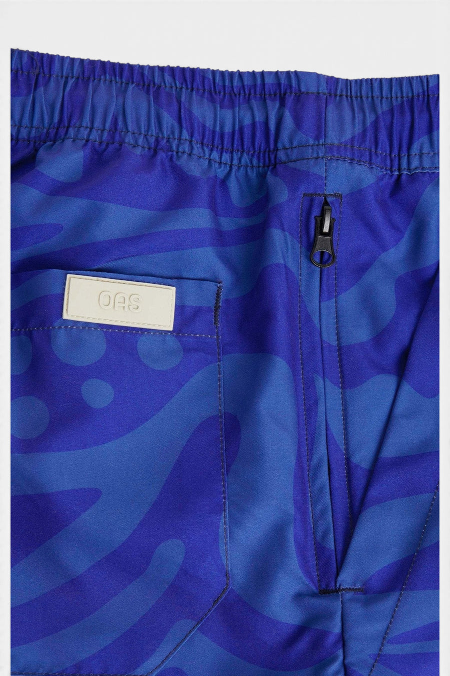 OAS Rapture Swim Short – flat lay