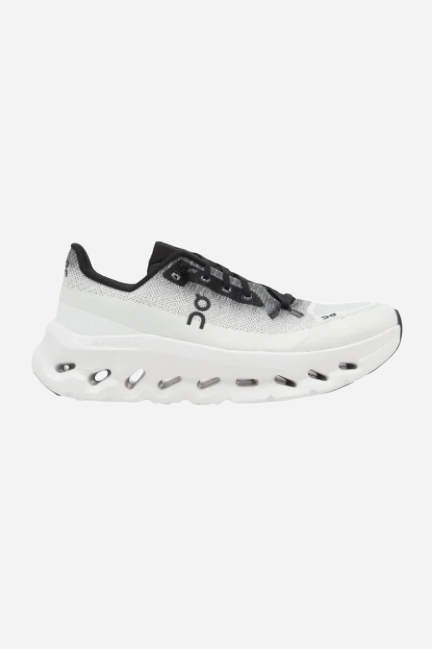 On Running Womens Cloudtilt 1 Sneakers in Black/Ivory – front view