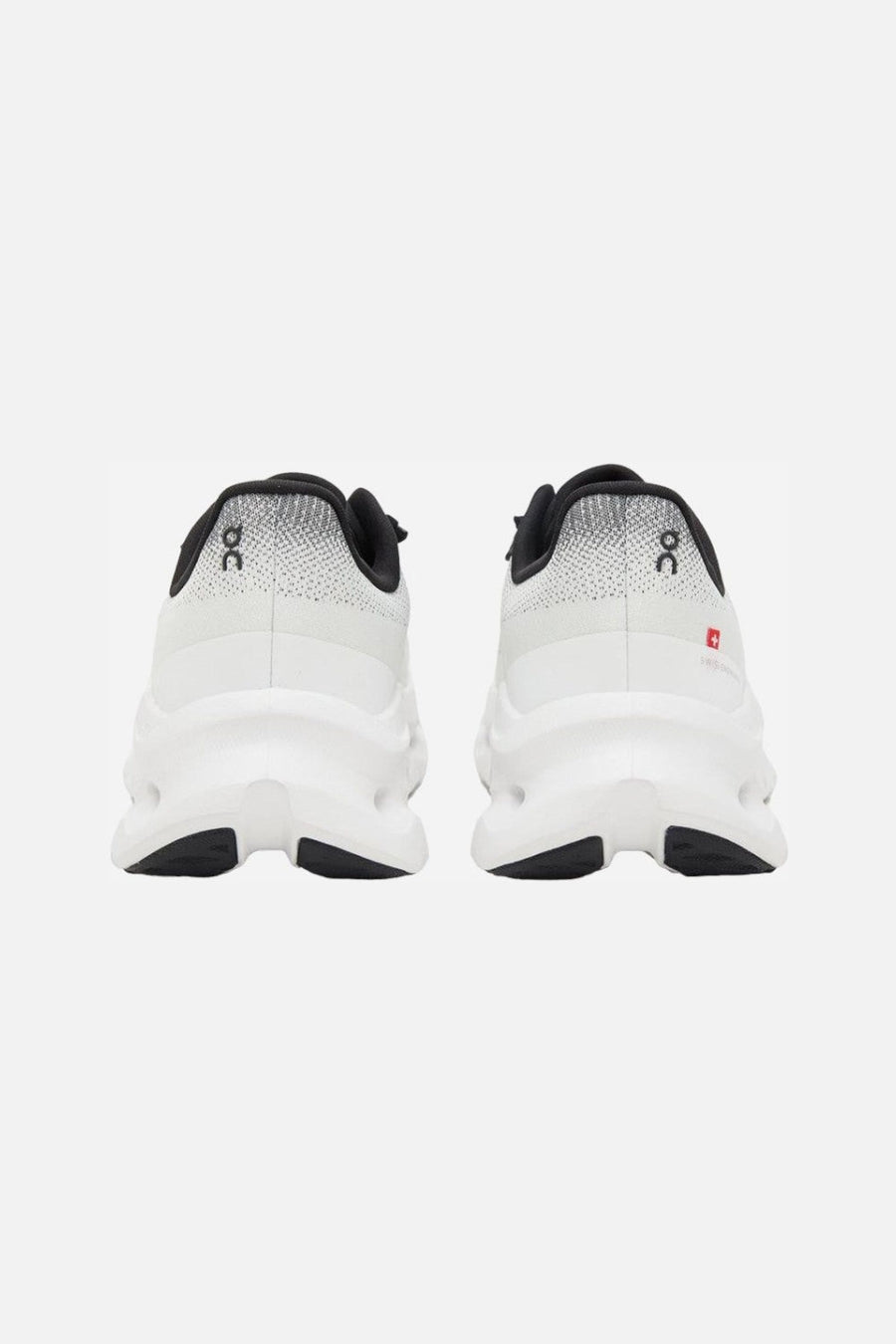 On Running Womens Cloudtilt 1 Sneakers in Black/Ivory – back view