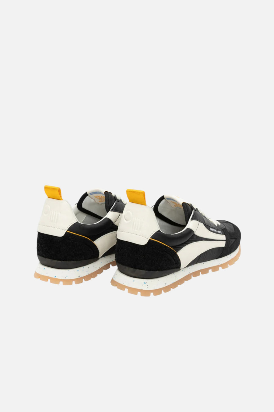 Oncept Women's Toronto Sneaker in Black – three-quarter view