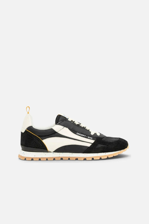 Oncept Women's Toronto Sneaker in Black – side view