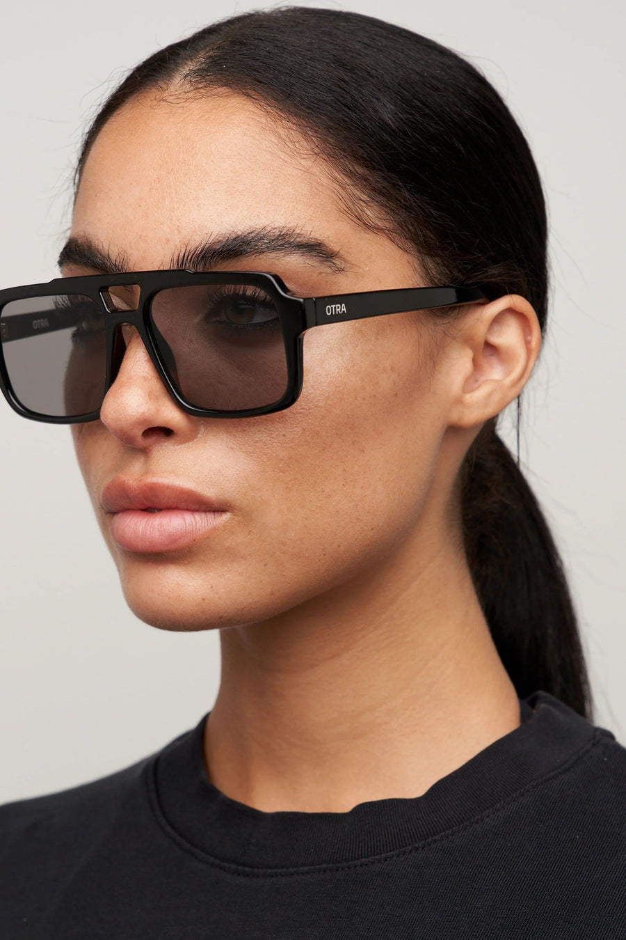 Otra Tame Sunglasses in Black and Smoke – detail