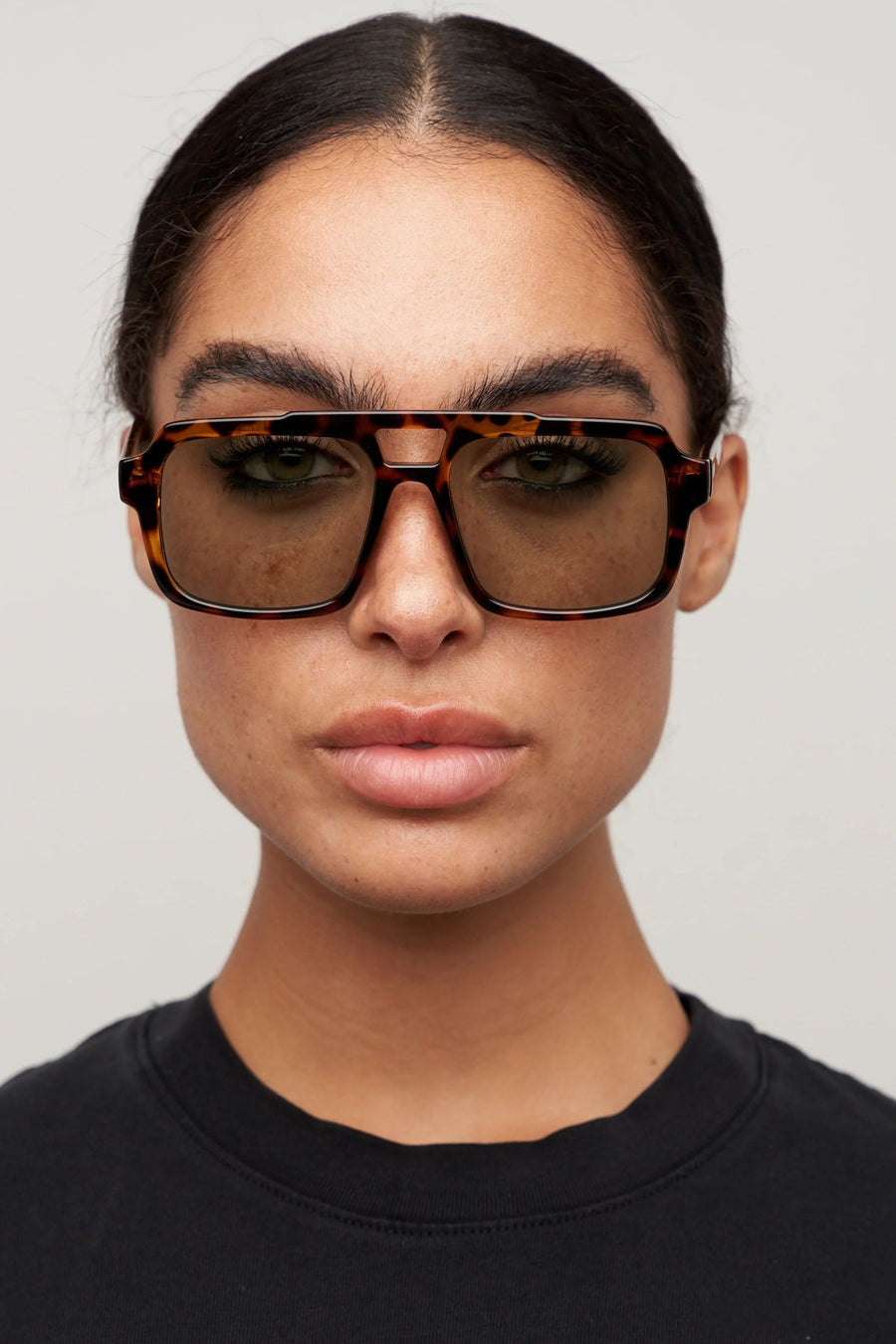 Otra Tame Sunglasses in Tort and Light Green – back view