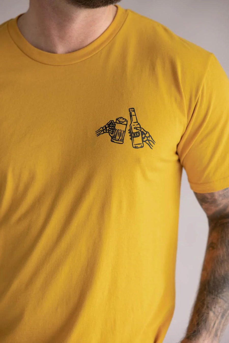 Sendero Shootin' Hand Salud Tee in Goldenrod – flat lay