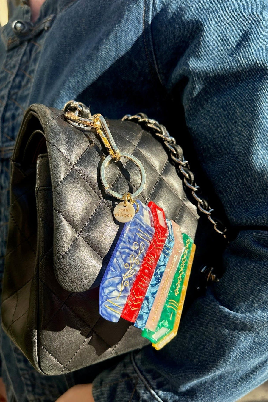 Solar Eclipse Hand-Painted Book Stack Bag Charm and Keychain – side view