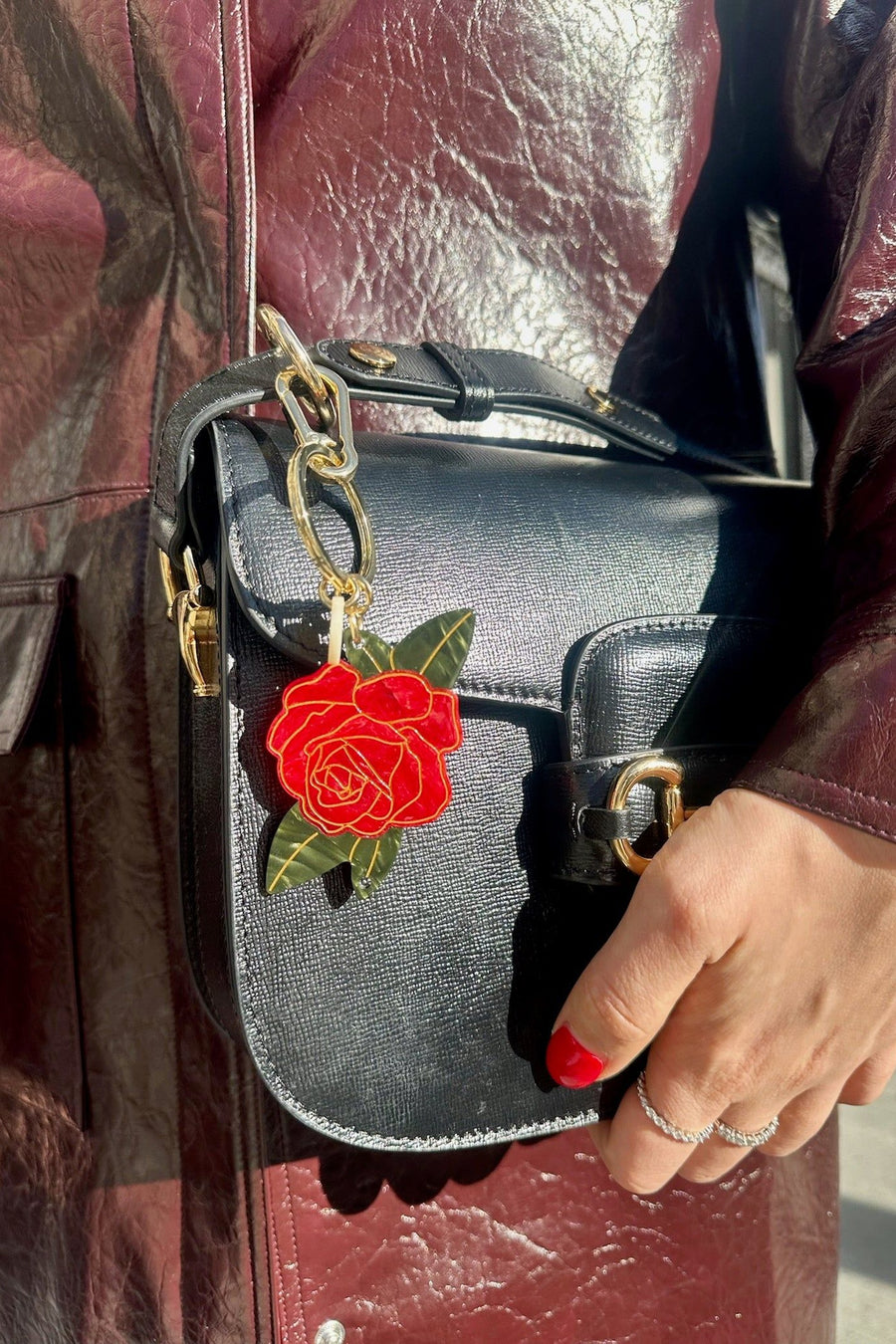 Solar Eclipse Rose Bag Charm – on model