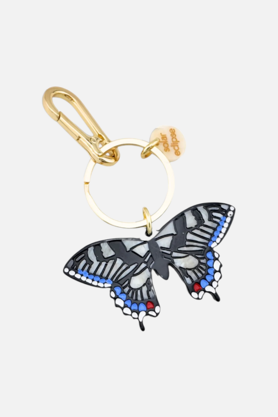 Solar Eclipse Swallowtail White Bag Charm – front view