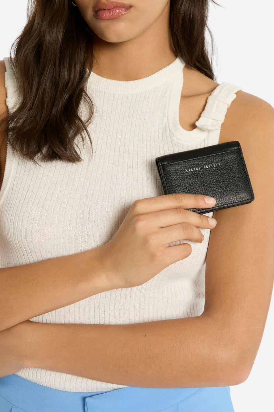 Status Anxiety Lumen Wallet in Black – flat lay
