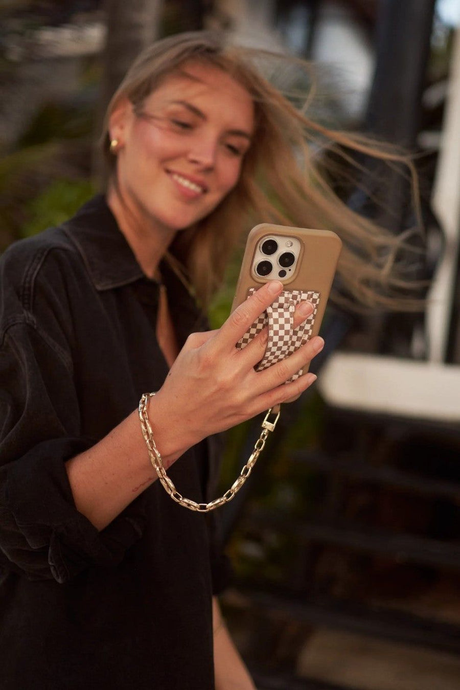 THE CAEP Goldi Peanut Wristlet – back view