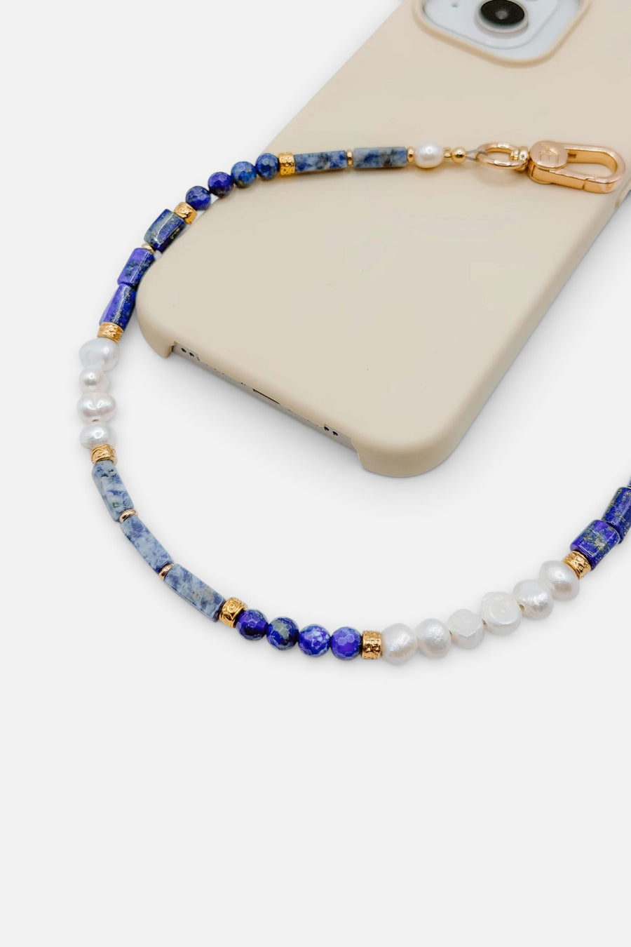 The Caep Indigo Strap Wristlet in Gold – back view