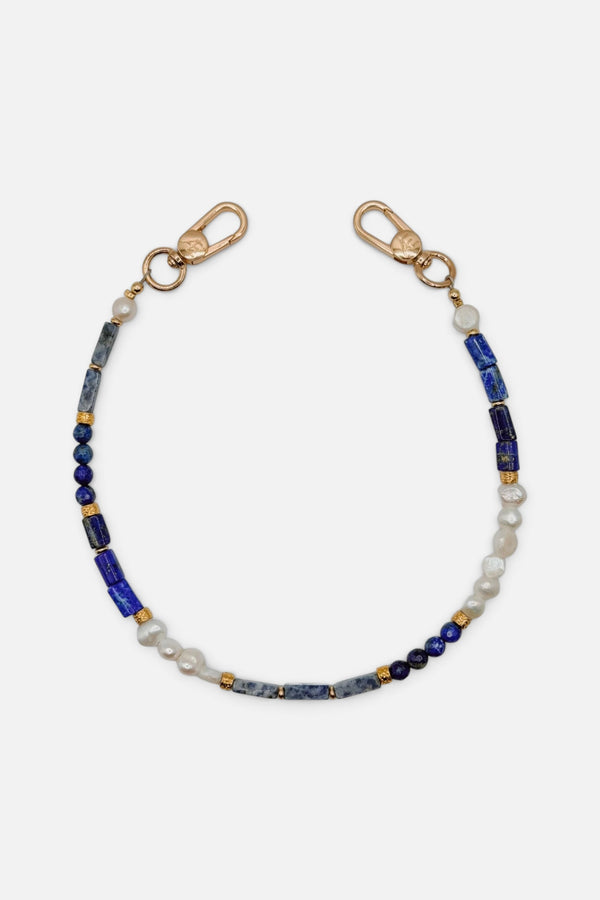 The Caep Indigo Strap Wristlet in Gold