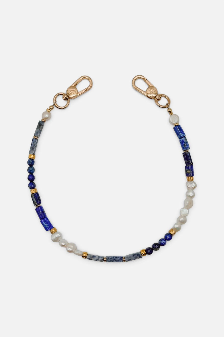 The Caep Indigo Strap Wristlet in Gold – front view