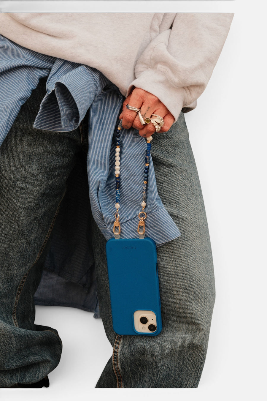 The Caep Indigo Strap Wristlet in Gold – side view