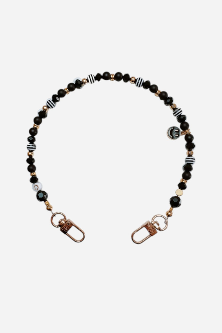 The Caep The Onyx Wristlet in Gold – front view